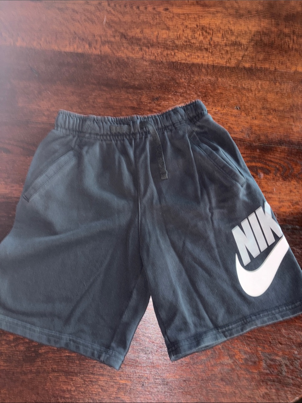 Nike Black Shorts with White Swoosh Logo